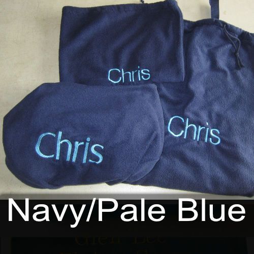A blue towel with the name chris embroidered on it