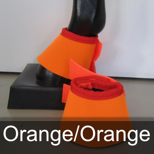 A pair of orange bell boots on a black horse