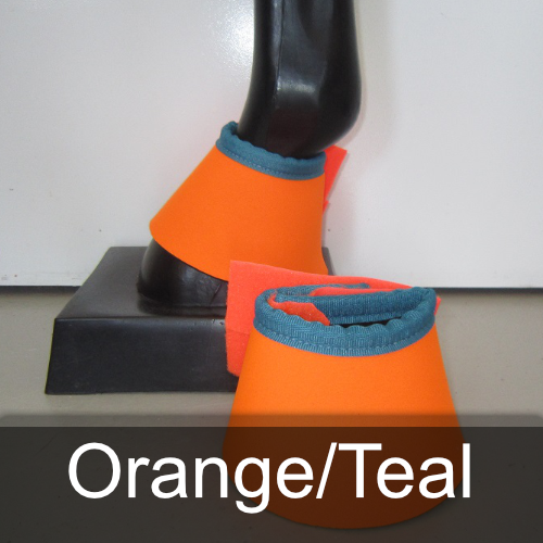 A pair of orange and teal bell boots on a mannequin