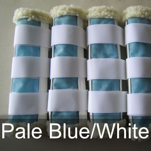 A pair of pale blue and white striped boots