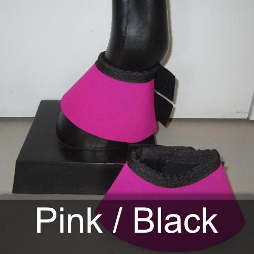 A pair of pink and black bell boots on a mannequin