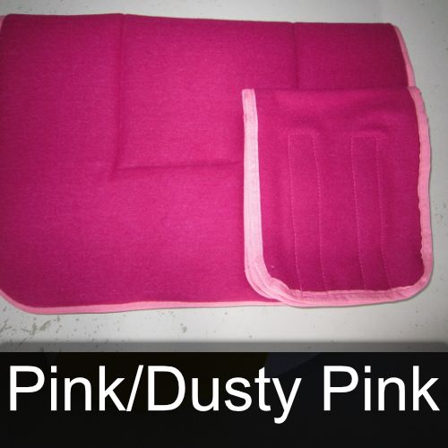 A pink blanket with a pink border and the words pink / dusty pink below it