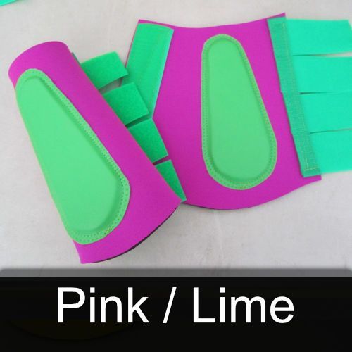 A pair of pink and green boots that say pink / lime