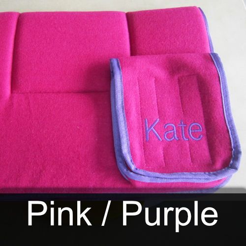 A pink and purple blanket with the name kate embroidered on it