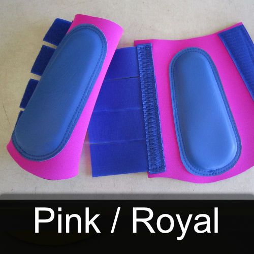 A pair of pink and blue boots that say pink / royal