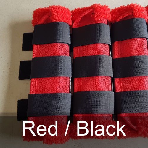 Three red / black leg wraps are stacked on top of each other