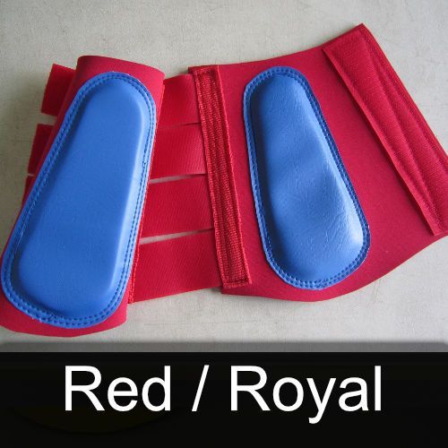 A pair of red / royal boots with blue pads