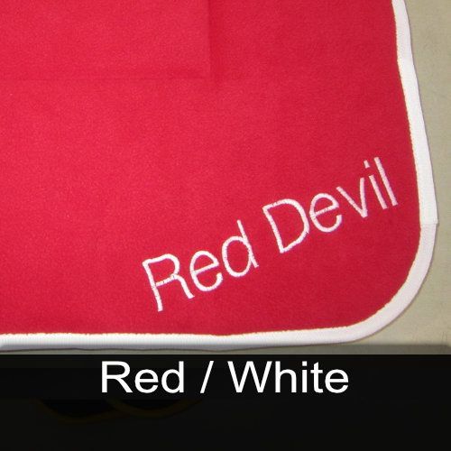 A red and white towel with the words red devil embroidered on it
