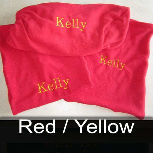 Two red shirts with kelly embroidered on them