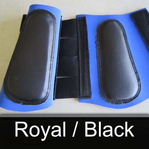 A pair of blue and black boots that say royal / black