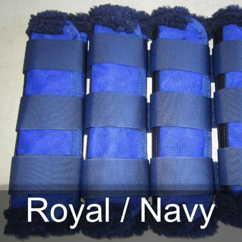 A row of blue boots with the words royal / navy on the bottom