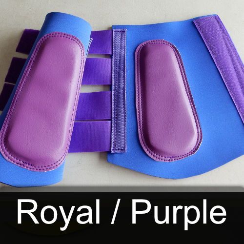 A pair of blue and purple boots that say royal / purple