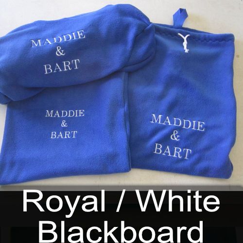 Two blue shirts with the names maddie and bart embroidered on them