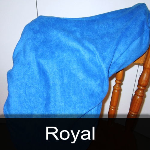 A blue blanket is sitting on a chair with the word royal below it