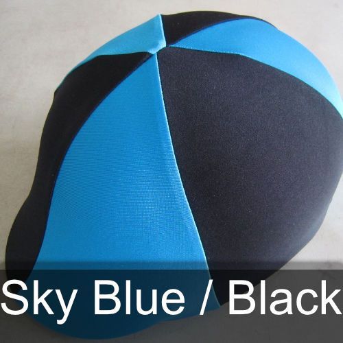 A blue and black hat with the words sky blue / black below it