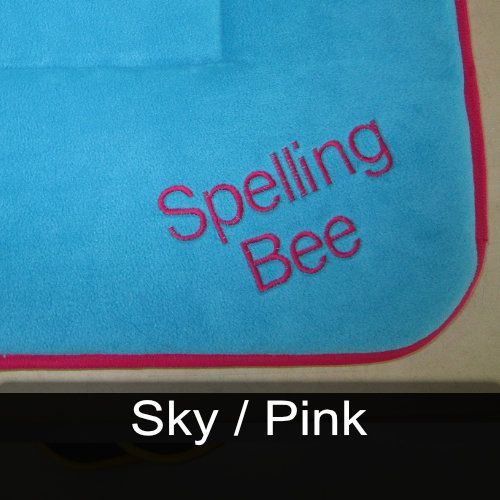 A blue towel with the words spelling bee embroidered on it