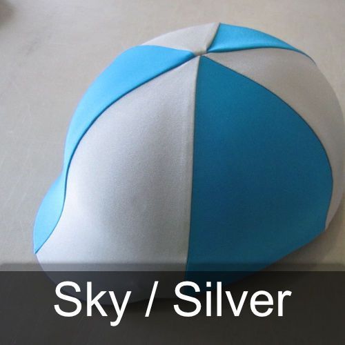 A blue and white hat with the words sky / silver below it