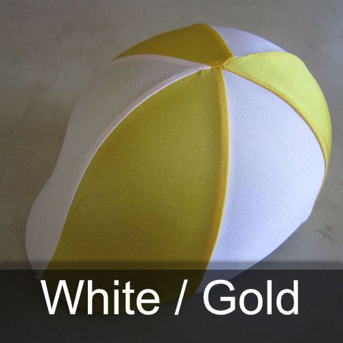 A yellow and white ball with the words white / gold below it