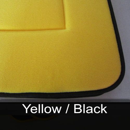 A yellow / black mat with a black border