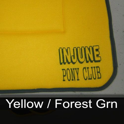 A yellow towel that says injune pony club on it