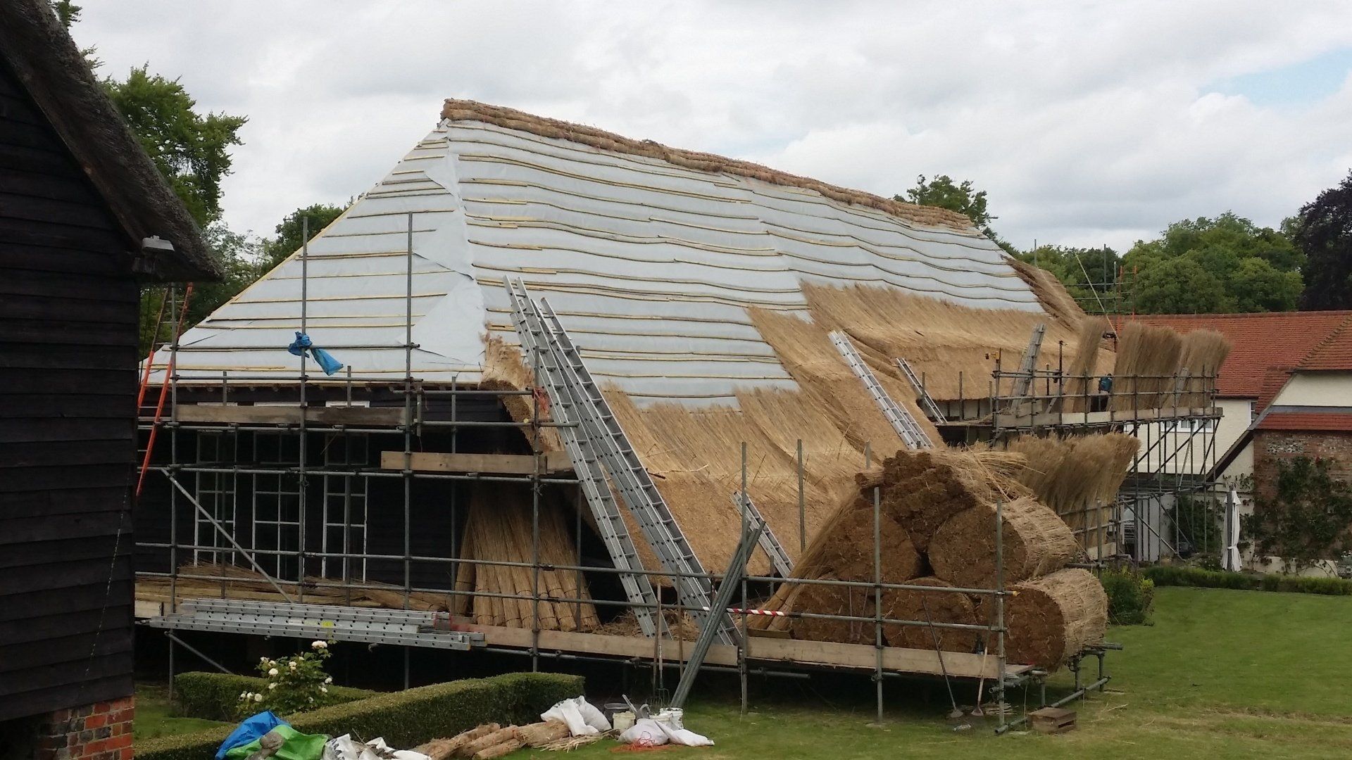 Thatching in progress - barn