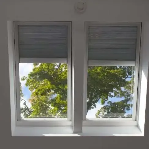 room with dark blinds 