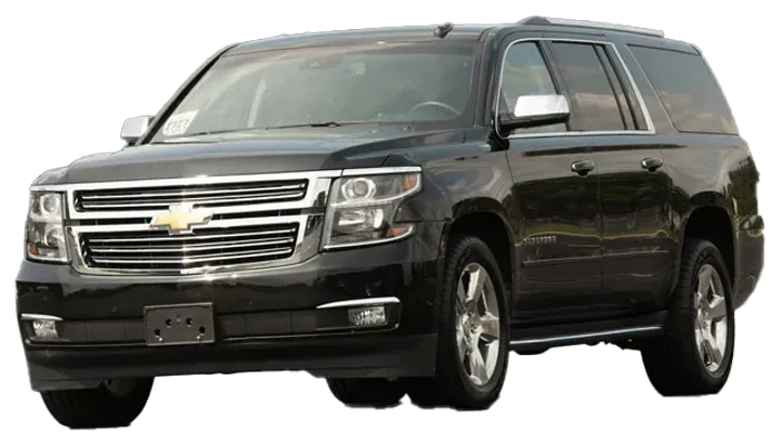 A black chevrolet suburban suv is parked on a white background.
