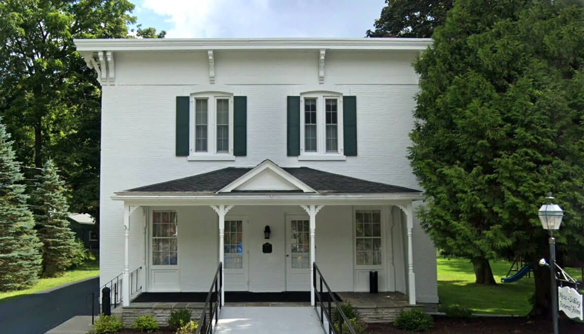 Exterior view of McPhearson-Rawls Funeral Home in Paris, TN