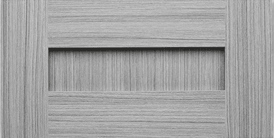 A close up of a gray wooden door with a shelf in the middle.