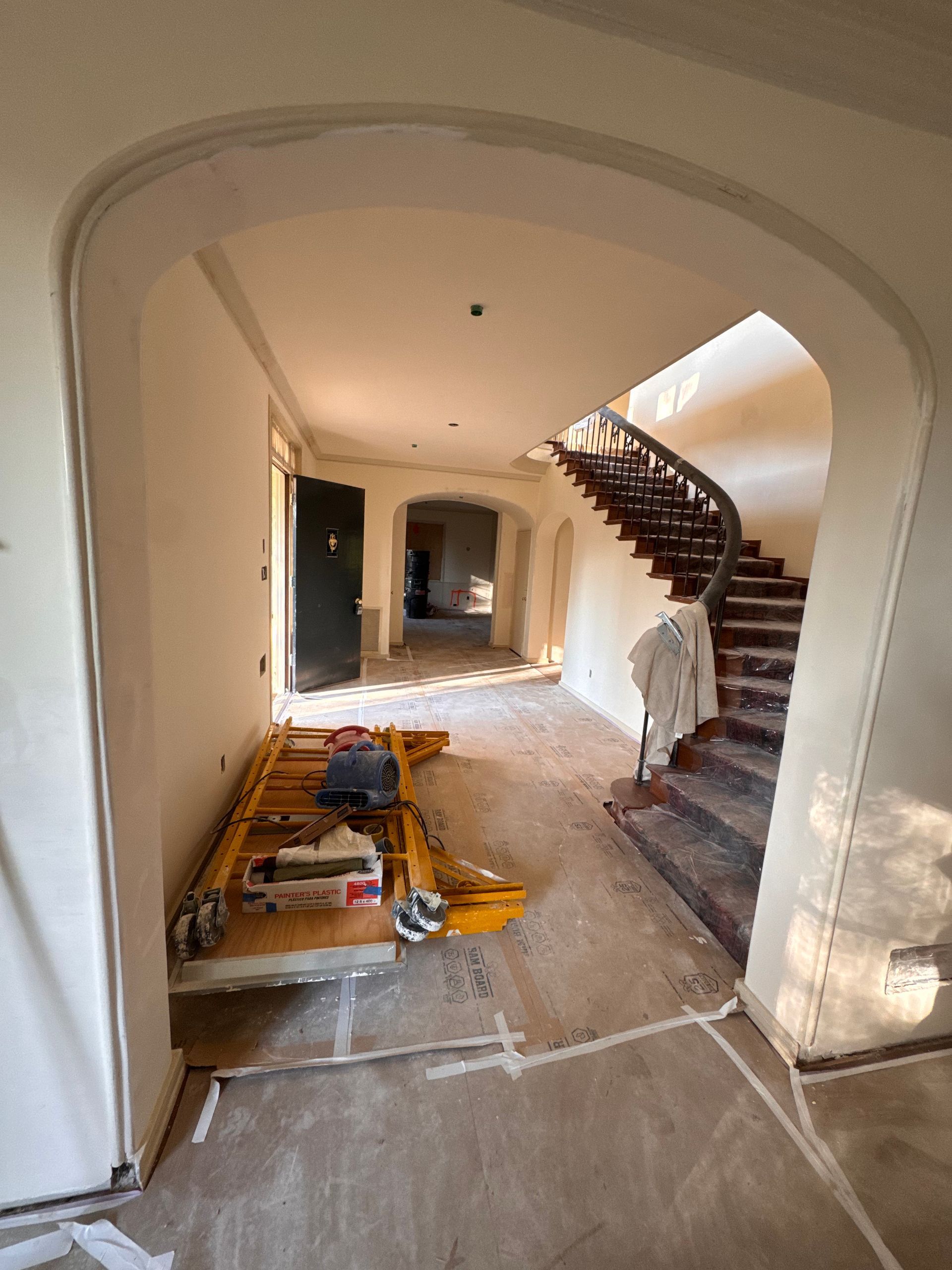 There is a staircase in the middle of the room.