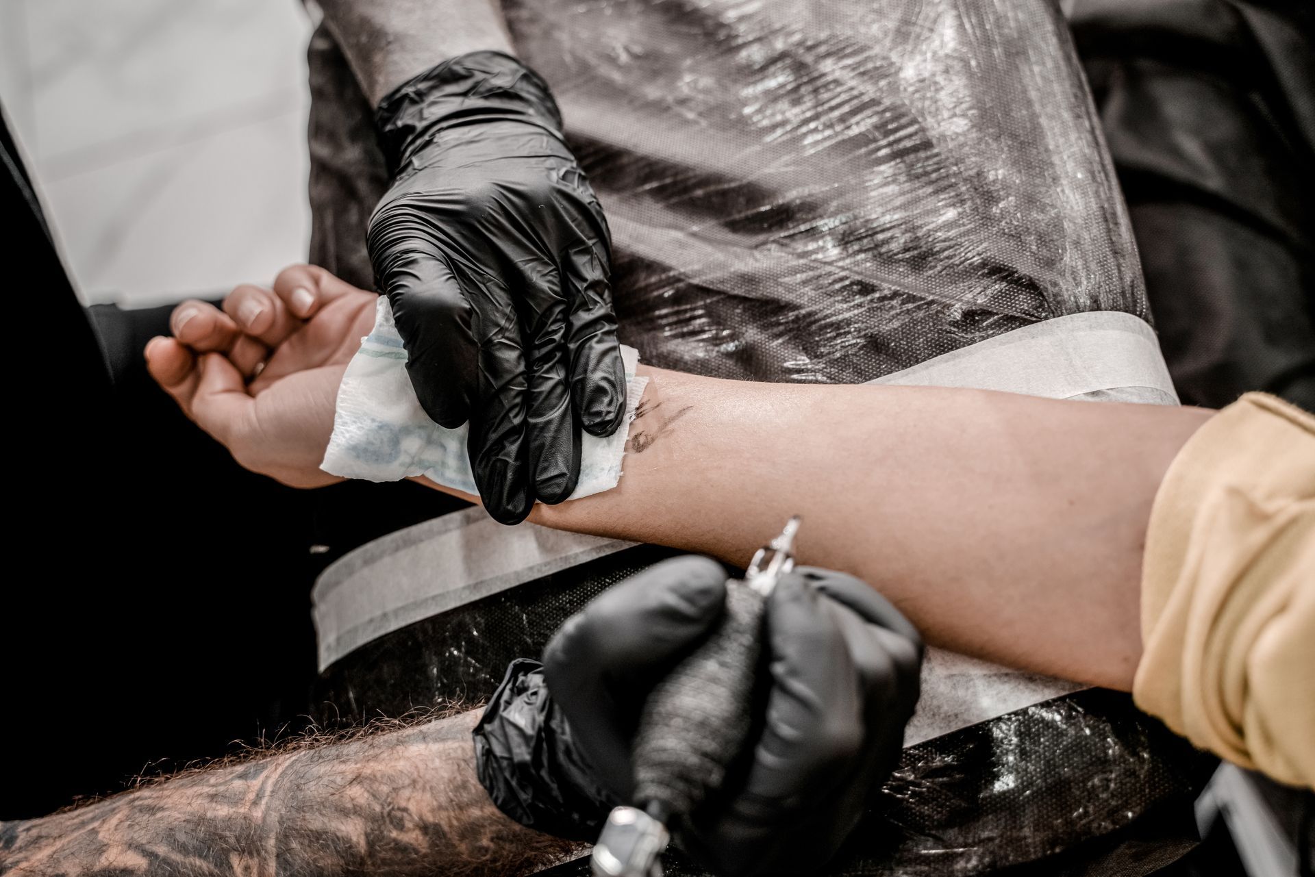 A person has a tattoo of a sandwich on their side.