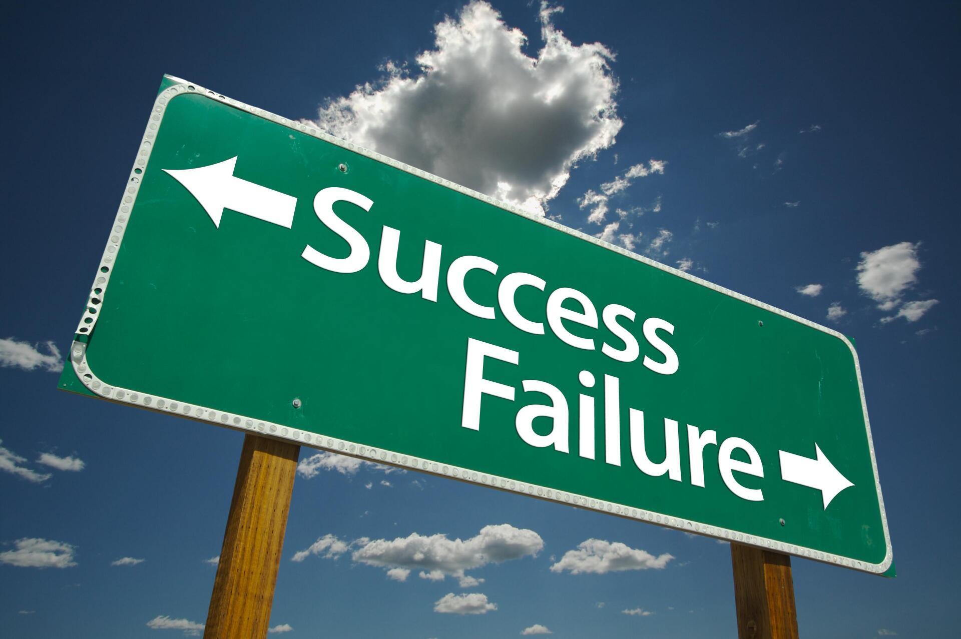sign with success and failure written on it