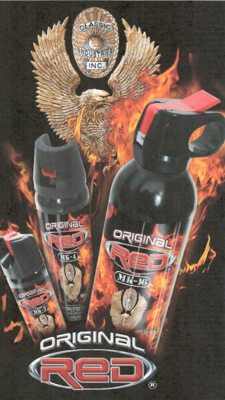 An advertisement for Original Red pepper spray canisters with a background of flames and an eagle emblem.