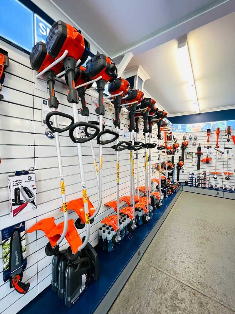 A Store Filled With Lots Of Tools Including Lawn Mowers — Mid Coast Mowers In Taree, NSW