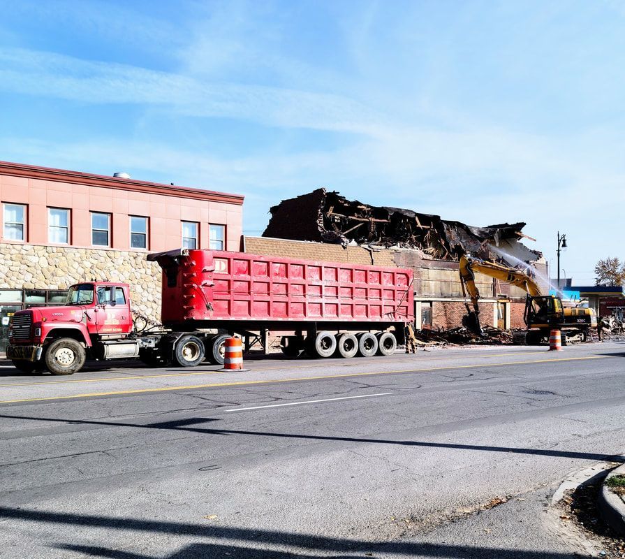 truck carrying demolition materials