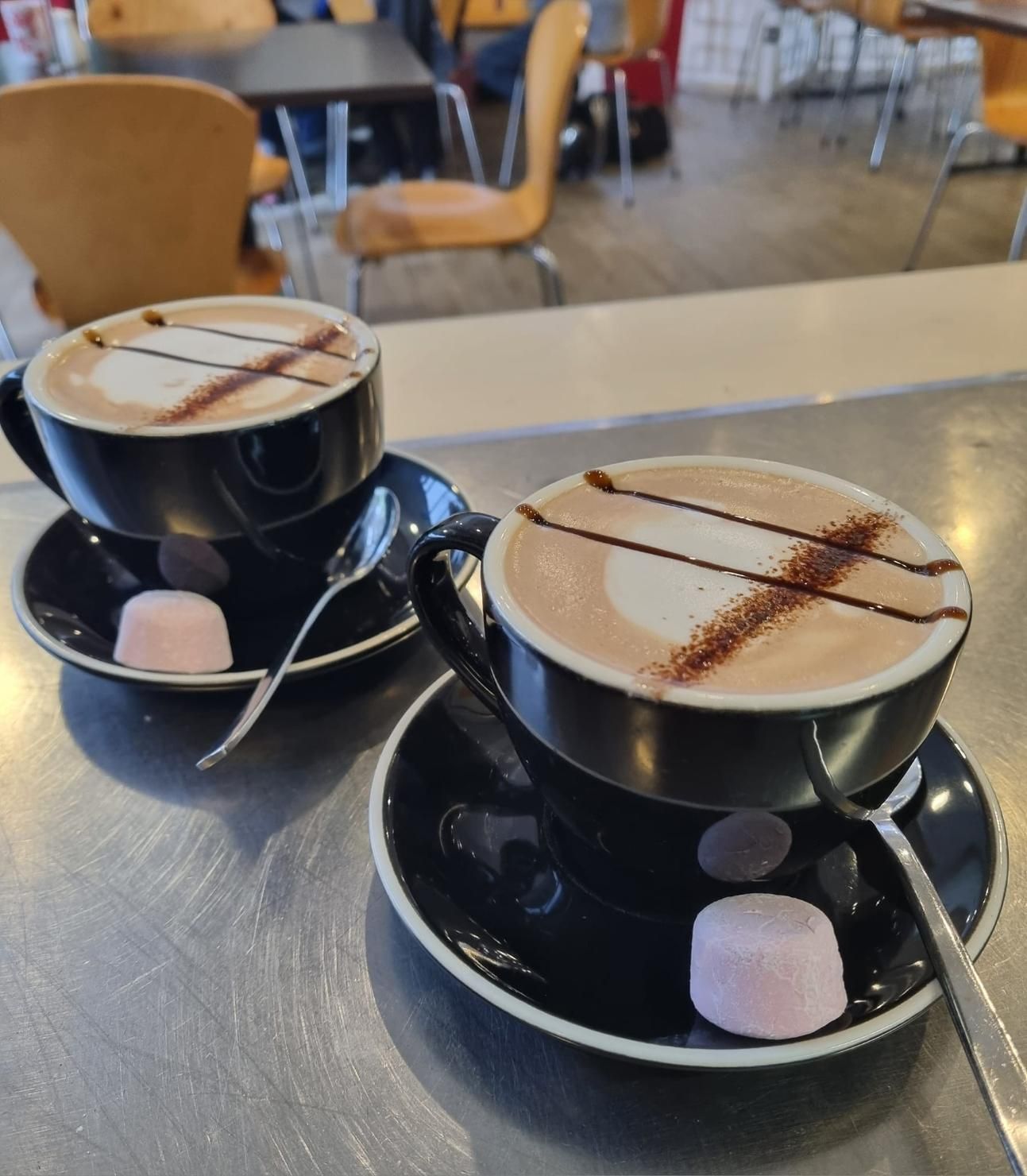 Two Cups Of Cappuccino With Marshmallows On The Saucers — Top Point Café In East Gosford, NSW
