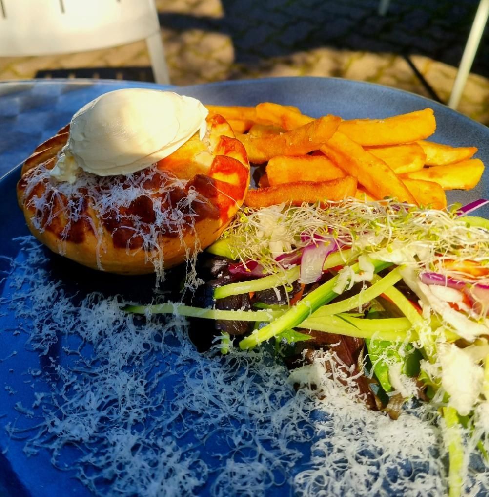 A Blue Plate Topped With A Hamburger And French Fries — Top Point Café In East Gosford, NSW