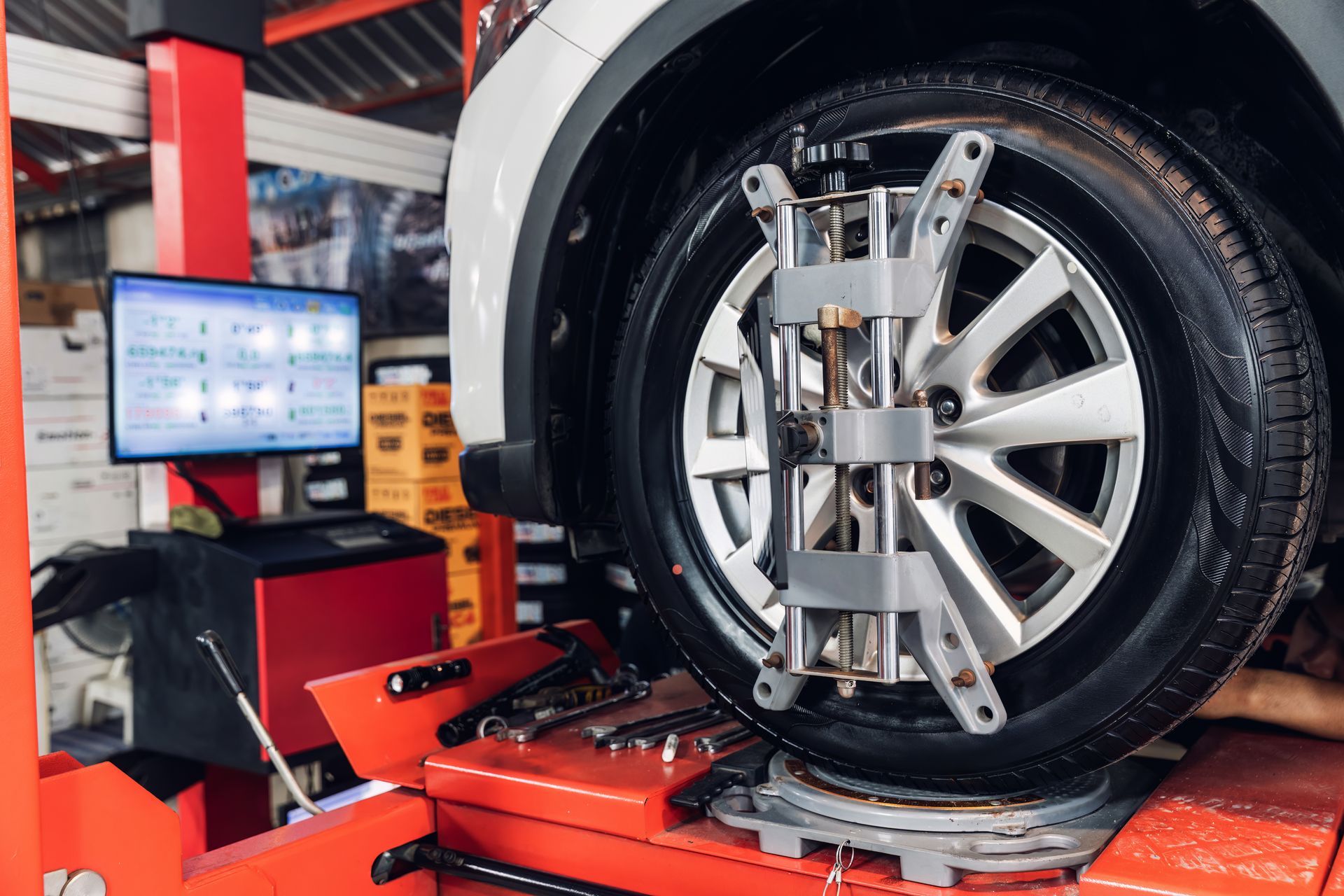 Mechanic Aligning the wheel | Agape Auto Repair