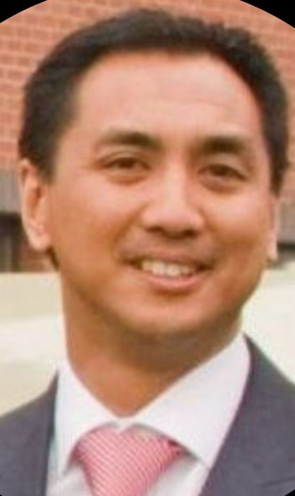 a basketball is going through a basketball hoop with a net