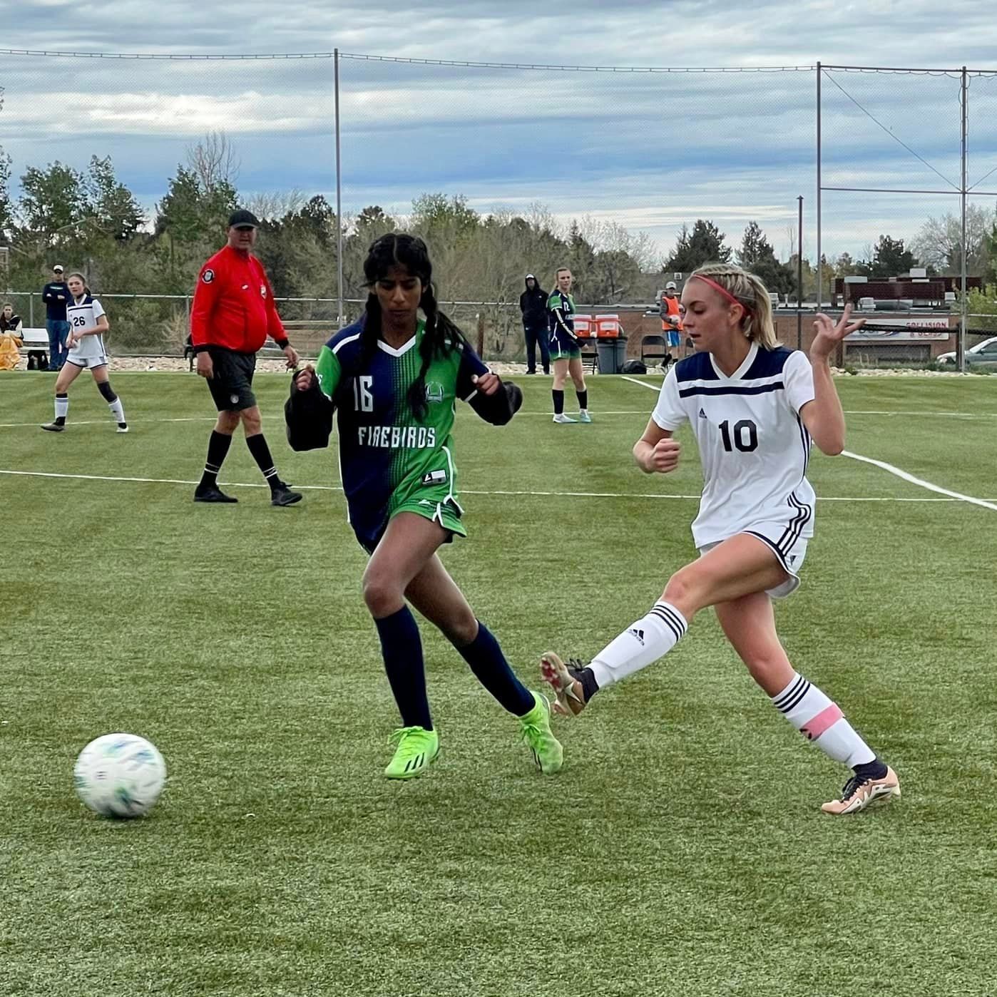 a soccer player with the number 10 on her jersey