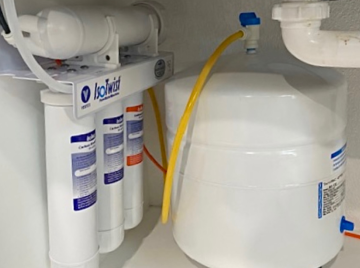 An iceland water filter is under a sink