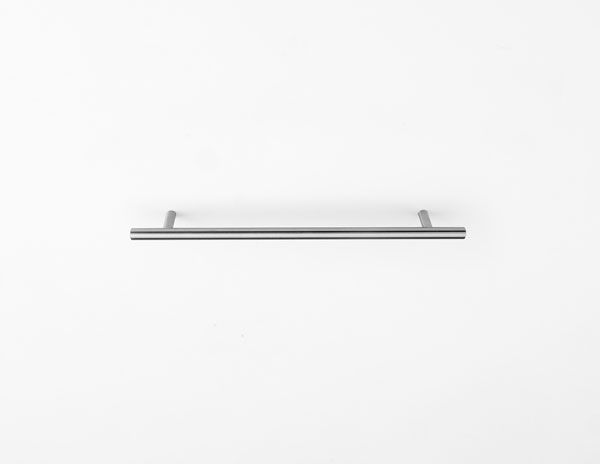 A stainless steel towel bar is hanging on a white wall.