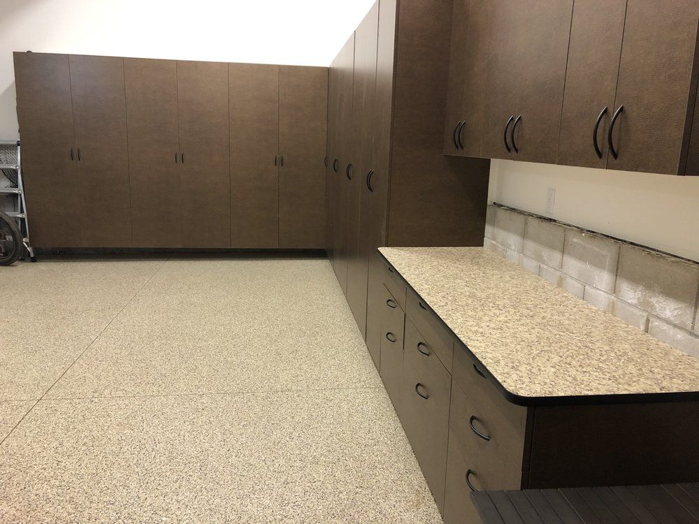 A kitchen with lots of cabinets and a counter top