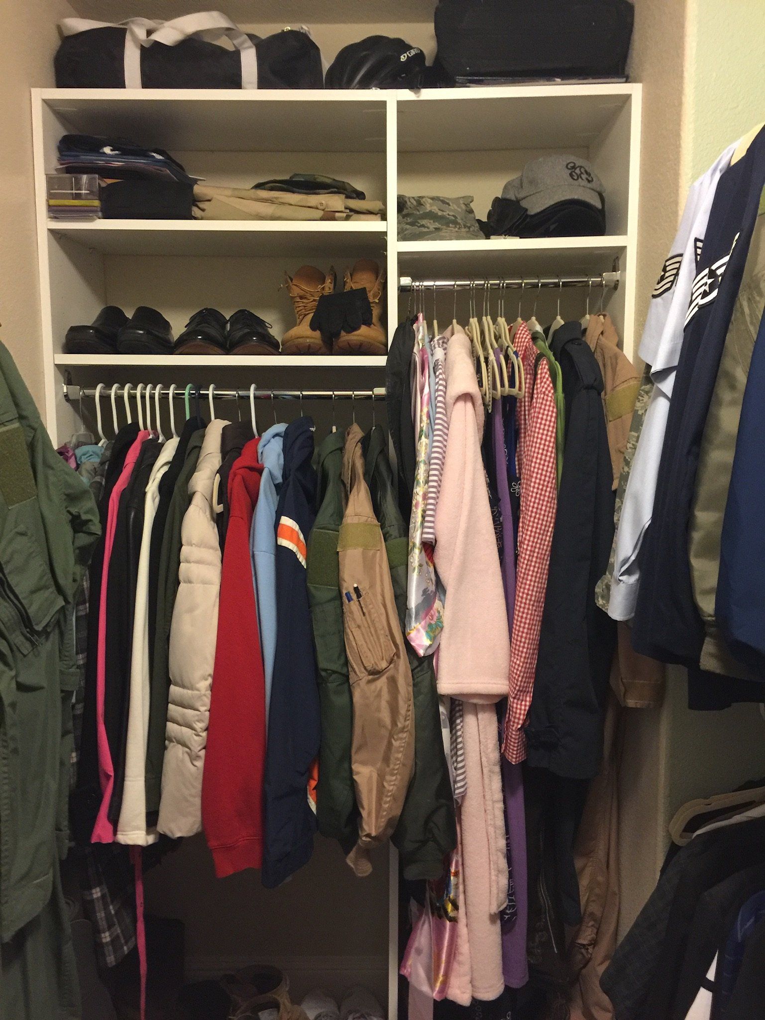 A closet filled with lots of clothes and shoes