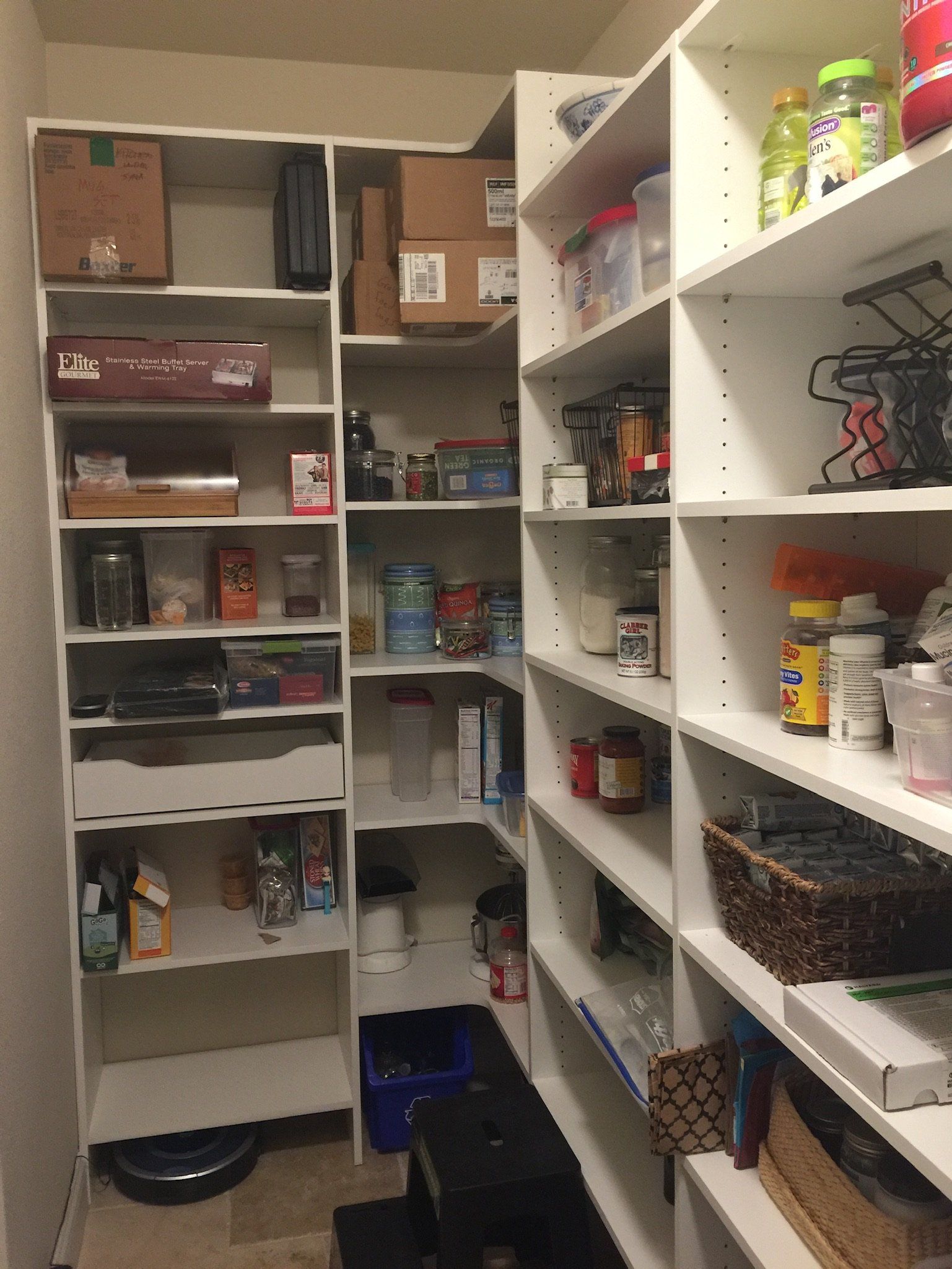 A pantry filled with lots of items including boxes and bottles