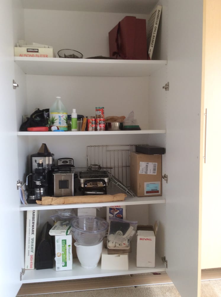 A pantry filled with various items including a box that says ' a ' on it