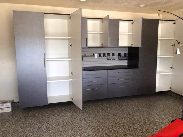 A room with a lot of cabinets and shelves