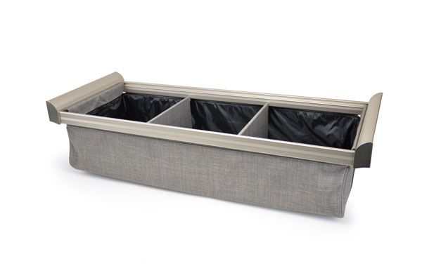 A laundry basket with three compartments on a white background.