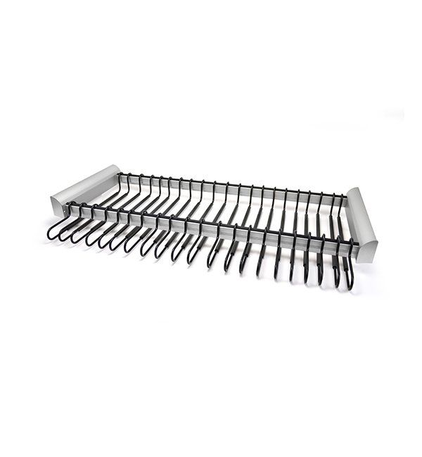 A tray with a bunch of knives in it on a white background.