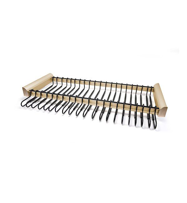 A tray with a bunch of nails on it on a white background.